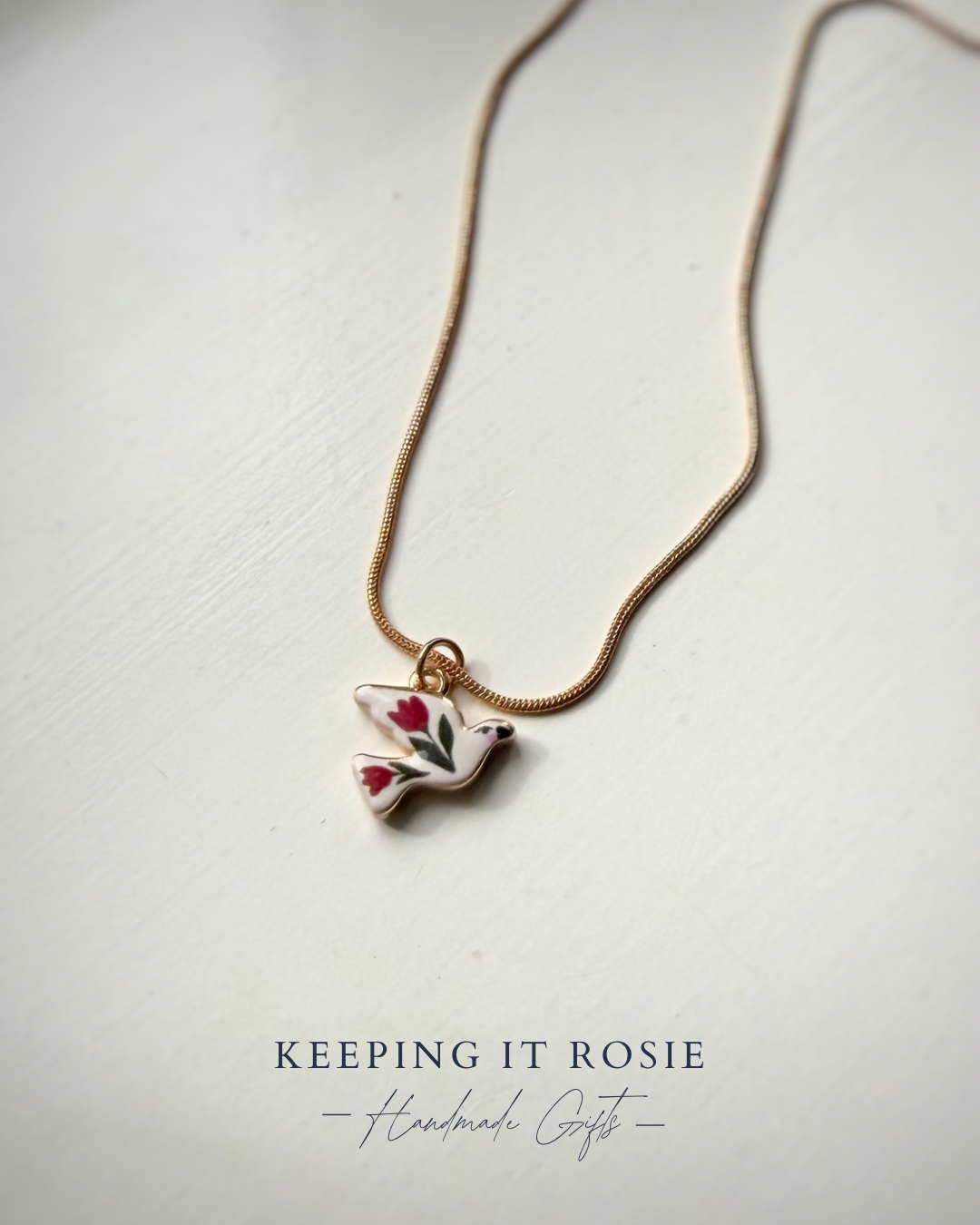 Gold Plated floral bird charm necklace